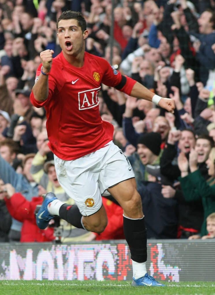 MANCHESTER, ENGLAND - NOVEMBER 11: Cristiano Ronaldo of Manchester United celebrates scoring their second goal during the Barclays FA Premier League match between Manchester United and Blackburn Rovers at Old Trafford on November 11 2007, in Manchester, England.