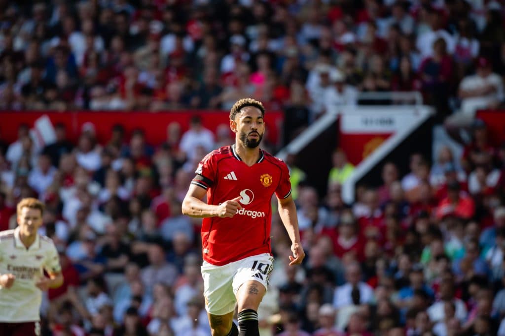 MANCHESTER, ENGLAND - AUGUST 17:  Matheus Cunha of Manchester United in action during the Premier League match between Manchester United and Arsenal at Old Trafford on August 17, 2025 in Manchester, United Kingdom. 