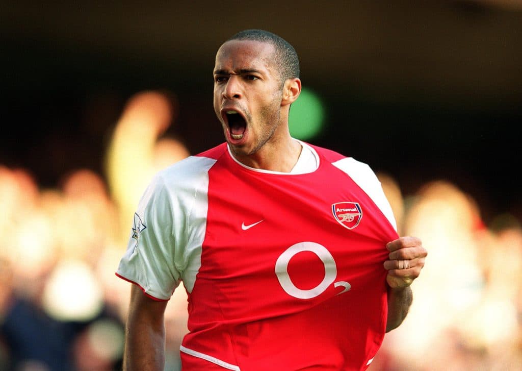LONDON, ENGLAND - OCTOBER 18: Thierry Henry celebrates scoring Arsenal's 2nd goal during the Premier League match between Arsenal and Chelsea on October 18, 2003 in London, England. 