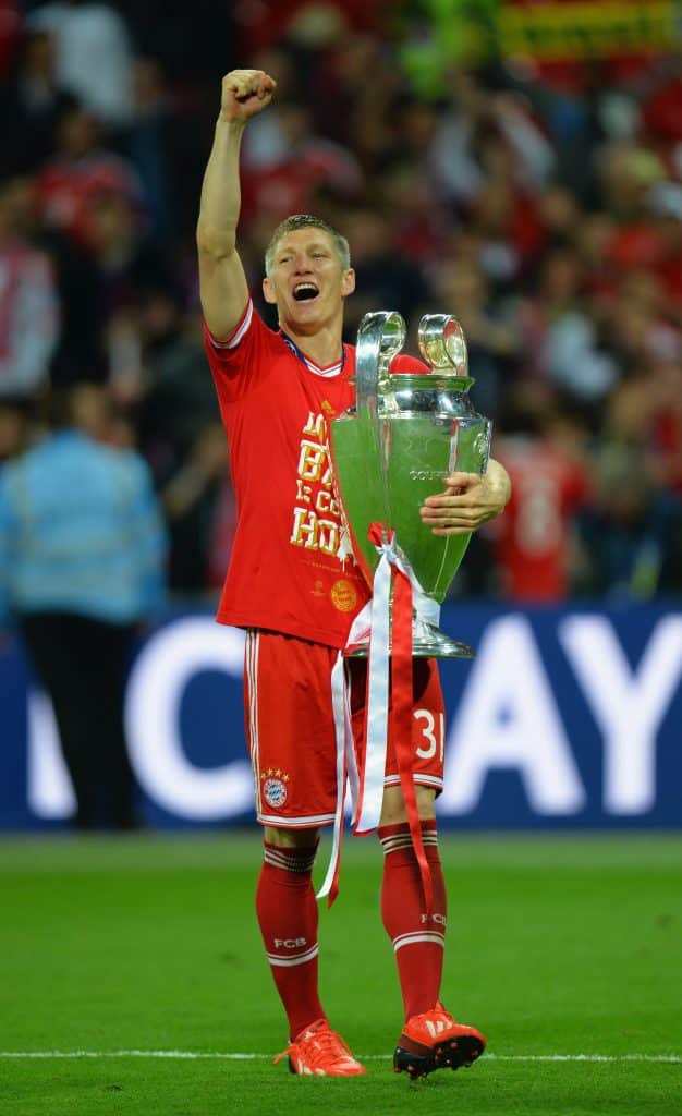 LONDON, ENGLAND - MAY 25:  Bastian Schweinsteiger of Bayern Muenchen holds the trophy after winning the UEFA Champions League final match against Borussia Dortmund at Wembley Stadium on May 25, 2013 in London, United Kingdom.  
