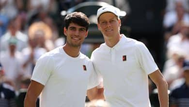 LONDON, ENGLAND - JULY 13: Carlos Alcaraz of Spain and Jannik Sinner of Italy pose for a photo at the net prior to the Gentleman's Singles Final on day fourteen of The Championships Wimbledon 2025 at All England Lawn Tennis and Croquet Club on July 13, 2025 in London, England.