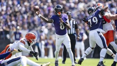 BALTIMORE, MARYLAND - SEPTEMBER 14: Lamar Jackson #8 of the Baltimore Ravens looks to pass during an NFL football game against the Cleveland Browns at M&T Bank Stadium on September 14, 2025 in Baltimore, Maryland.