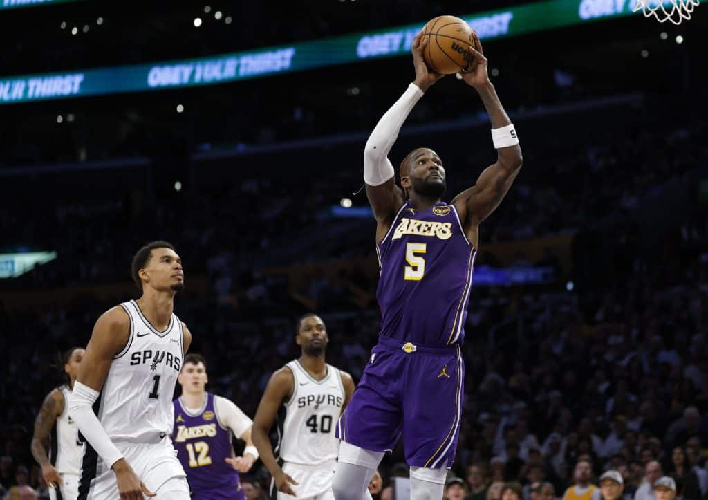 LOS ANGELES, CALIFORNIA - NOVEMBER 05: Deandre Ayton #5 of the Los Angeles Lakers scores in front of Victor Wembanyama #1 of the San Antonio Spurs during a 118-116 Los Angeles Lakers win over the San Antonio Spurs at Crypto.com Arena on November 05, 2025 in Los Angeles, California. (Photo by Harry How/Getty Images). NOTE TO USER: User expressly acknowledges and agrees that, by downloading and or using this photograph, User is consenting to the terms and conditions of the Getty Images License Agreement.
