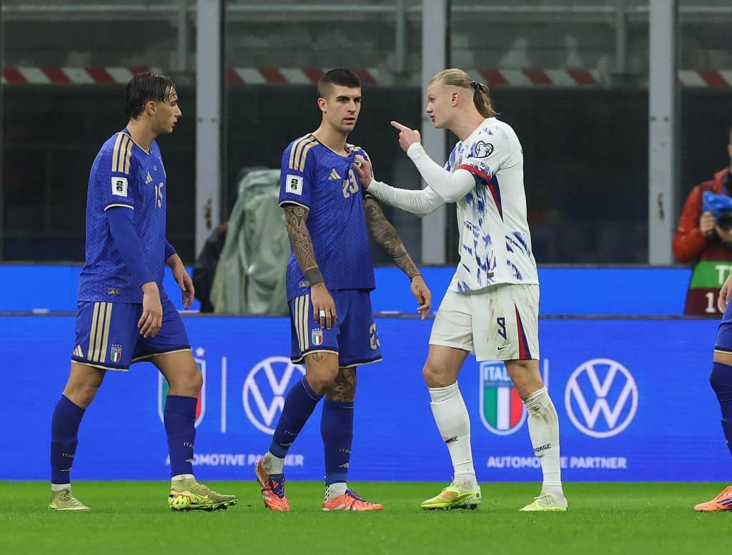 MILAN, ITALY - NOVEMBER 16: Gianluigi Mancini of Italy and Erling Haaland of Norway react during the FIFA World Cup 2026 qualifier match between Italy and Norway at San Siro Stadium on November 16, 2025 in Milan, Italy.