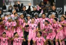 Inter Miami's Argentine forward #10 Lionel Messi (C) celebrates with the trophy after his team's victory in the Major League Soccer (MLS) Eastern Conference final football match between Inter Miami and New York City FC at Chase Stadium in Fort Lauderdale, Florida on November 29, 2025. Lionel Messi and Inter Miami reached the MLS Cup final for the first time on November 29, 2025 after a 5-1 thrashing of New York City FC in the Eastern Conference playoffs.