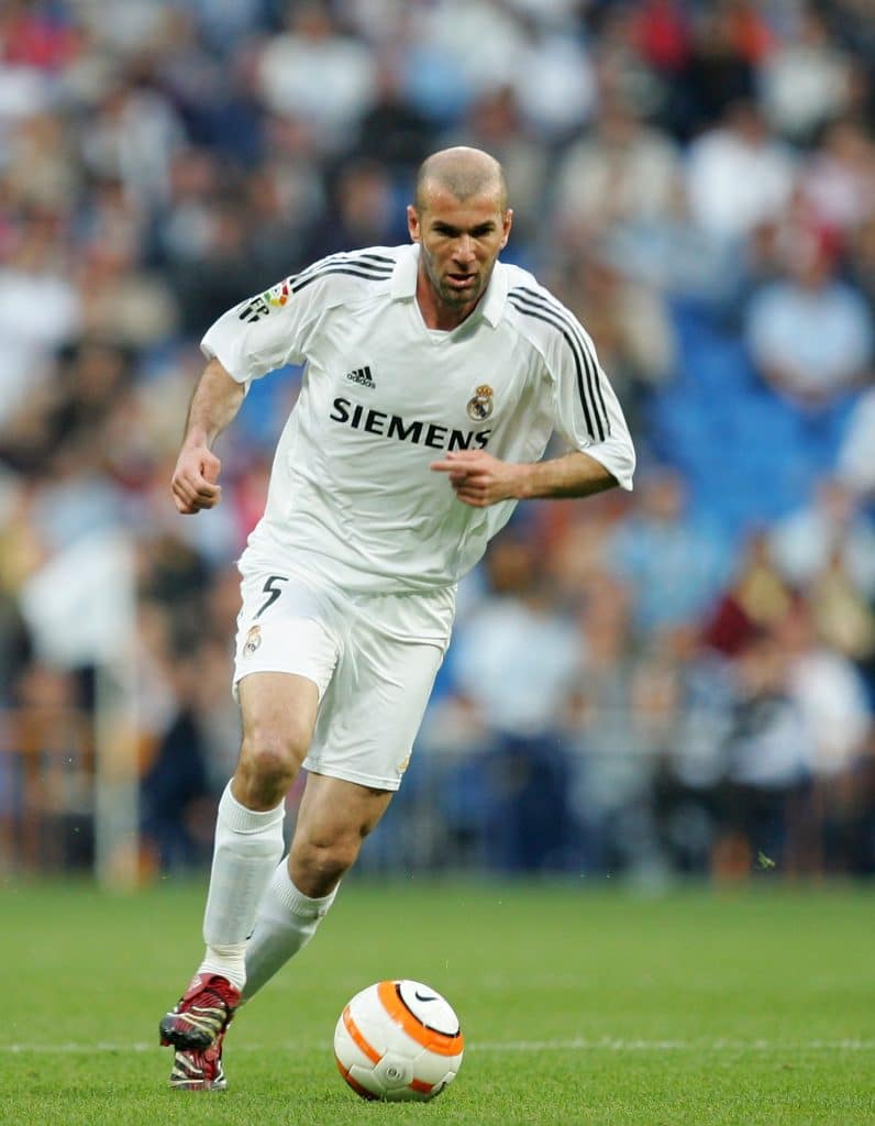 MADRID, SPAIN - APRIL 08: Zinedine Zidane of Real Madrid dribblres with the ball during the Primera Liga match between Real Madrid and Real Sociedad at the Santiago Bernabeu stadium on April 8, 2006 in Madrid, Spain.