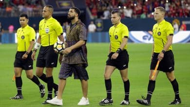 Rapper/Singer Drake brings out the game ball with the officials at NRG Stadium