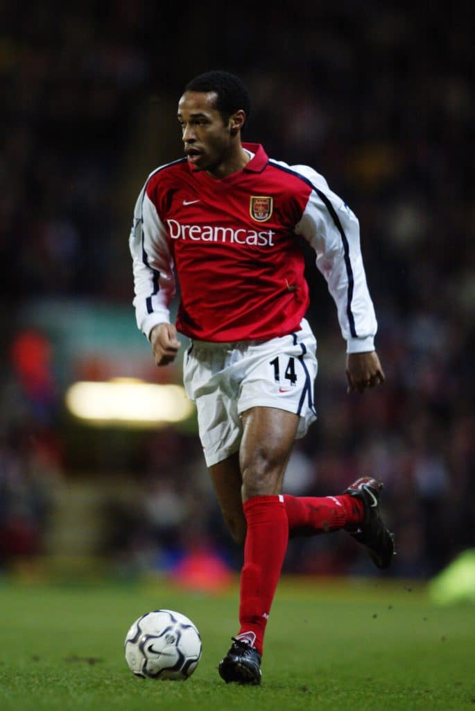 30 Jan 2002: Thierry Henry of Arsenal runs with the ball during the FA Barclaycard Premiership match between Blackburn Rovers and Arsenal played at Ewood Park, in Blackburn, England. Arsenal won the match 3-2. DIGITAL IMAGE. \