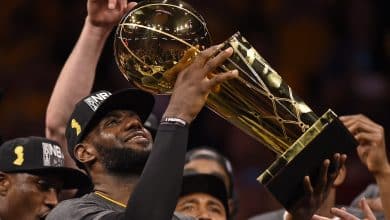 Cleveland Cavaliers' LeBron James (23) holds up the Larry O'Brien trophy after defeating the Golden State Warriors in Game 7 of the NBA Finals at Oracle Arena in Oakland, Calif., on Sunday, June 19, 2016. The Cleveland Cavaliers defeated the Golden State Warriors 93-89 to win the NBA championship.