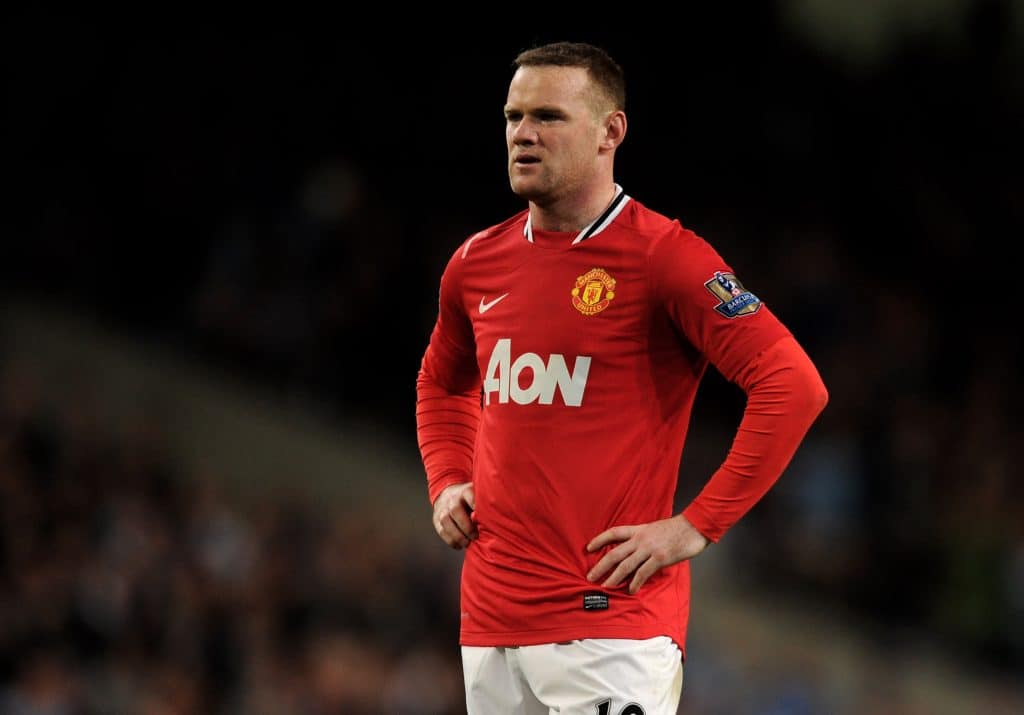 MANCHESTER, ENGLAND - APRIL 30: Wayne Rooney of Manchester United looks dejected at the end of the Barclays Premier League match between Manchester City and Manchester United at the Etihad Stadium on April 30, 2012 in Manchester, England.