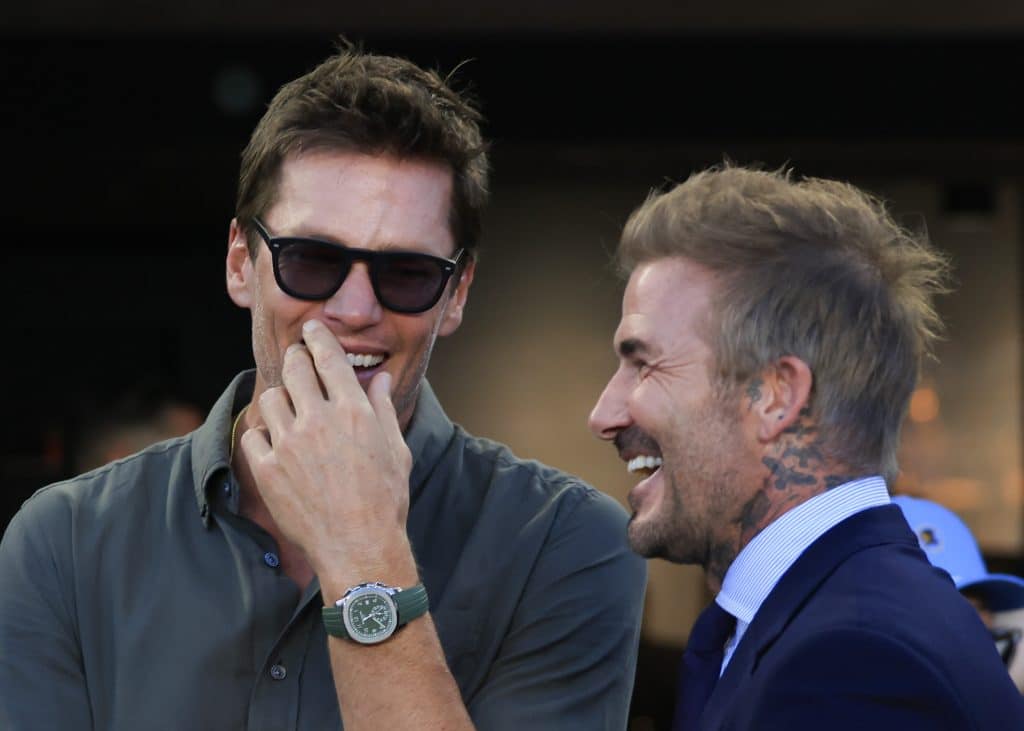 FORT LAUDERDALE, FLORIDA - AUGUST 24: David Beckham and Tom Brady speak prior to a game between the Inter Miami and the FC Cincinnati at Chase Stadium on August 24, 2024 in Fort Lauderdale, Florida. 