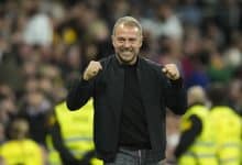 Hansi Flick head coach of Barcelona celebrates the goal of his team during the La Liga match between Real Madrid CF and FC Barcelona at Estadio Santiago Bernabeu on October 27, 2024 in Madrid, Spain.