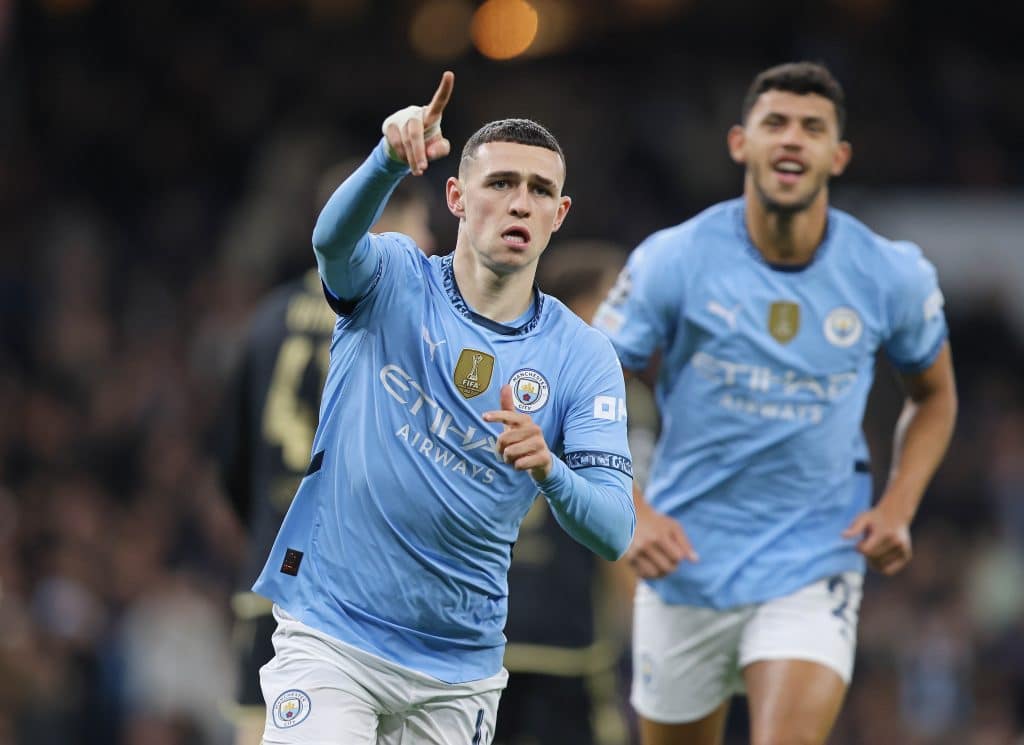Phil Foden of Manchester City goal celebration after scoring to put Manchester City 1-0 ahead during the UEFA Champions League 2024/25 League Phase MD3 match between Manchester City and AC Sparta Praha at City of Manchester Stadium on October 23, 2024 in Manchester, England.