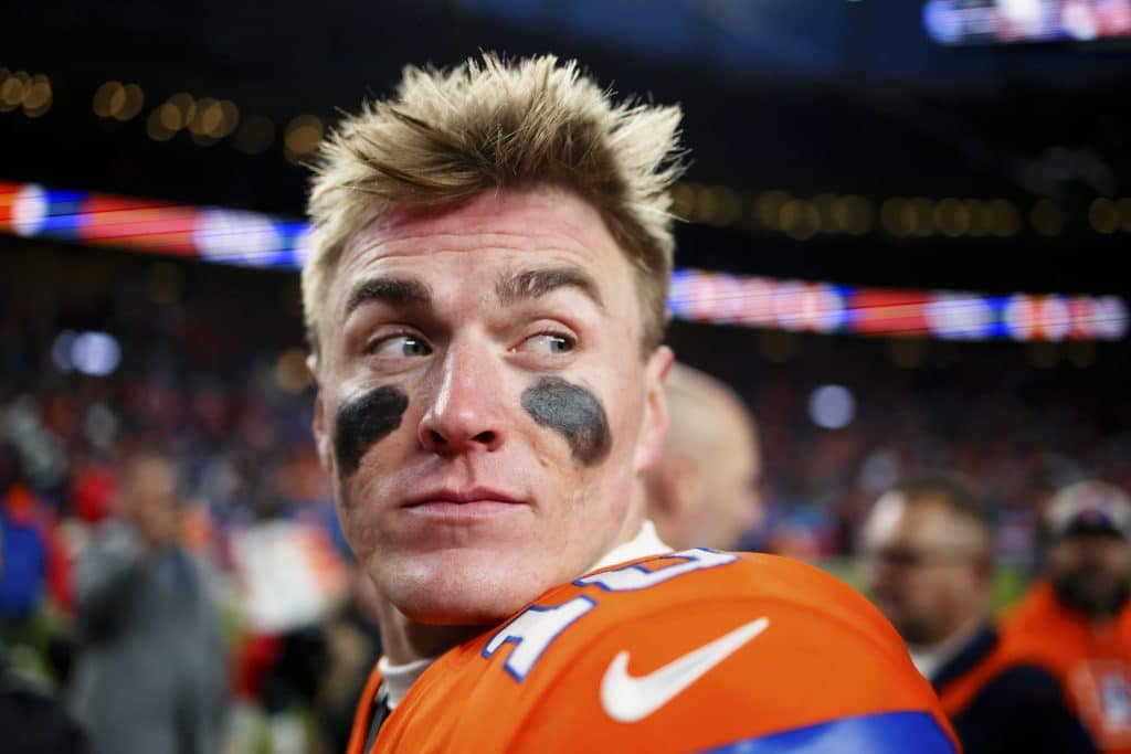 DENVER, CO - JANUARY 5:  Quarterback Bo Nix #10 of the Denver Broncos walks off the field after a 38-0 win against the Kansas City Chiefs at Empower Field at Mile High on January 5, 2025 in Denver, Colorado. 