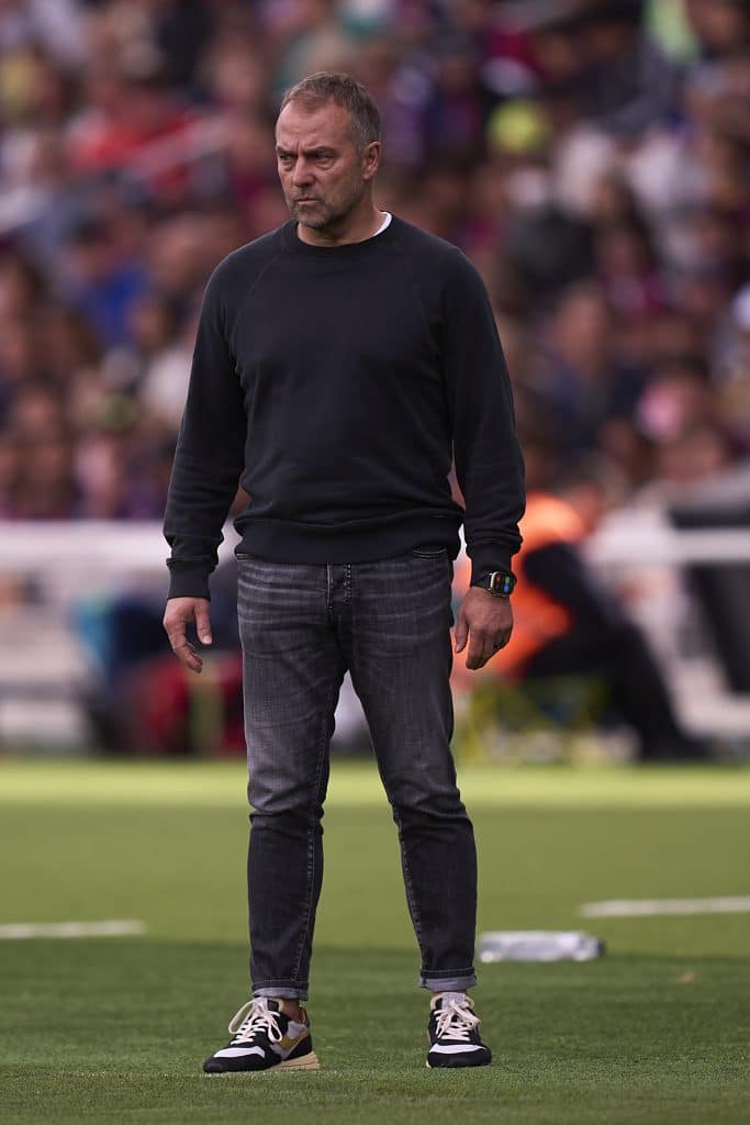 BARCELONA, SPAIN - APRIL 19: Hansi Flick, Manager of FC Barcelona looks on during the La Liga match between FC Barcelona and RC Celta de Vigo at Estadi Olimpic Lluis Companys on April 19, 2025 in Barcelona, Spain. 