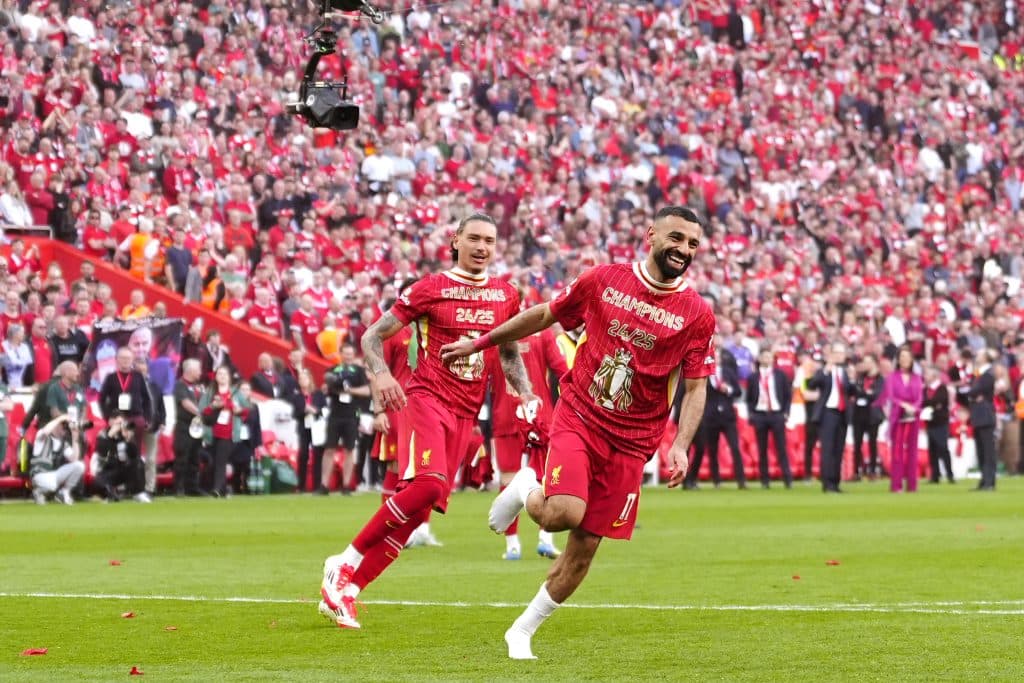 Liverpool's Mohamed Salah (right) and team-mates celebrate victory and the Premier League title following the Premier League match at Anfield, Liverpool. Picture date: Sunday April 27, 2025.
