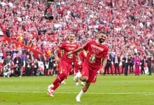 Liverpool's Mohamed Salah (right) and team-mates celebrate victory and the Premier League title following the Premier League match at Anfield, Liverpool. Picture date: Sunday April 27, 2025.