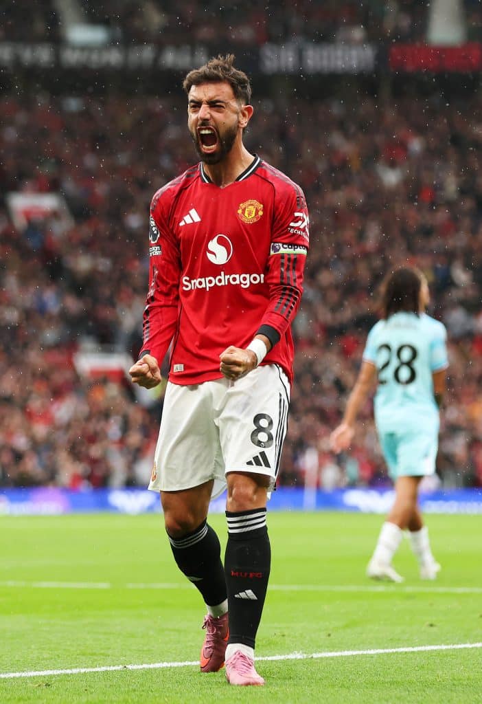 MANCHESTER, ENGLAND - AUGUST 30: Bruno Fernandes of Manchester United celebrates after Josh Cullen of Burnley (not pictured) scores his teams own goal during the Premier League match between Manchester United and Burnley at Old Trafford on August 30, 2025 in Manchester, England.