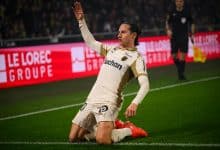 Lens' French forward #10 Florian Thauvin celebrates after scoring during the French L1 football match between FC Nantes and RC Lens at the Beaujoire stadium in Nantes, western France on December 6, 2025.