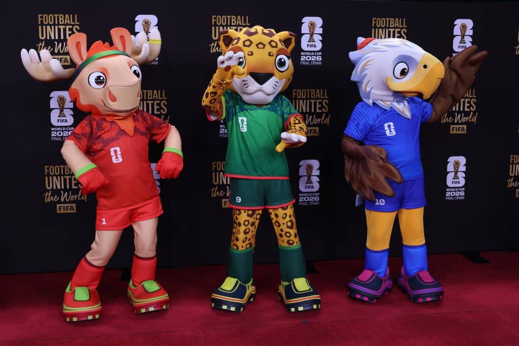 FIFA World Cup mascots Maple the Moose of Canada, Zayu the Jaguar of Mexico, and Clutch the Eagle