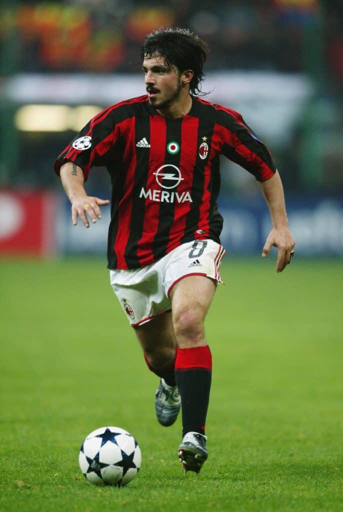 MILAN - MARCH 23:  Gennaro Gattuso of AC Milan runs with the ball during the UEFA Champions League Quarter Final, First Leg match between AC Milan and Deportivo La Coruna held on March 23, 2004 at the Giuseppe Meazza Stadium, in Milan, Italy. AC Milan won the match 4-1. 