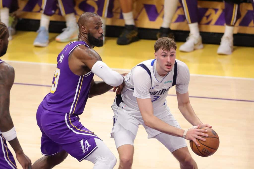 Los Angeles Lakers forward Lebron James (23) guards Dallas Mavericks forward Cooper Flagg (32) during the NBA Cup game between the Dallas Mavericks and the Los Angeles Lakers on November 28, 2025, at Crypto.com Arena in Los Angeles, CA.