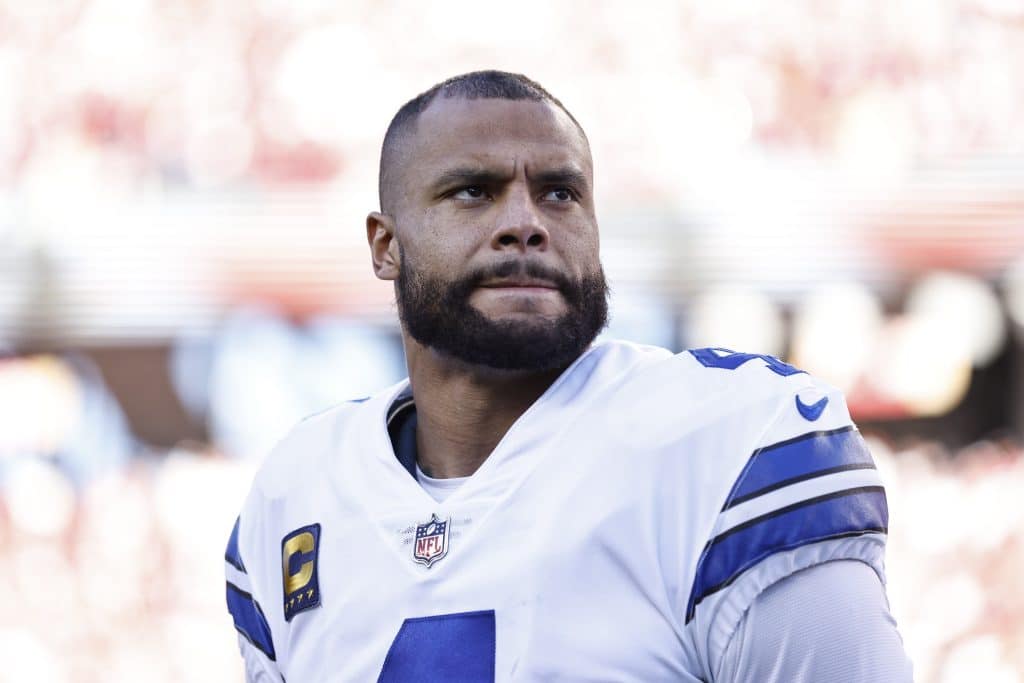 SANTA CLARA, CALIFORNIA - JANUARY 22: Dak Prescott #4 of the Dallas Cowboys looks on during the national anthem prior to an NFL divisional round playoff football game between the San Francisco 49ers and the Dallas Cowboys at Levi's Stadium on January 22, 2023 in Santa Clara, California. 