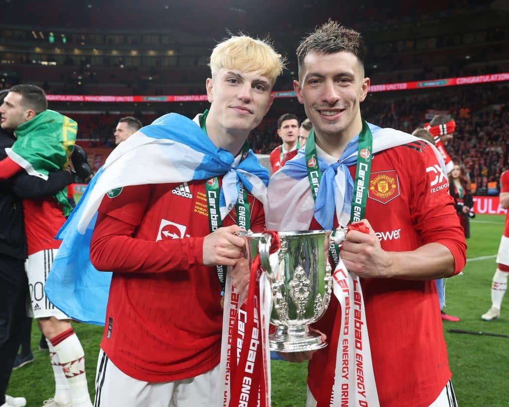 LONDON, ENGLAND - FEBRUARY 26: Alejandro Garnacho, Lisandro Martinez of Manchester United celebrate with the trophy after the Carabao Cup Final match between Manchester United and Newcastle United at Wembley Stadium on February 26, 2023 in London, England. 