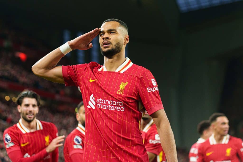 Cody Gakpo celebrates after scoring Liverpool's first goal during the Premier League match between Liverpool and Manchester City at Anfield in Liverpool, England, on December 1, 2024.