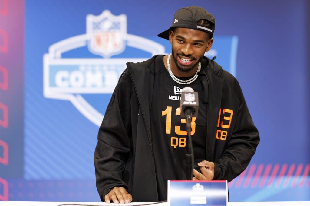 INDIANAPOLIS, INDIANA - FEBRUARY 28: Shedeur Sanders #QB13 of Colorado speaks at the podium during the 2025 NFL Combine at the Indiana Convention Center on February 28, 2025 in Indianapolis, Indiana.