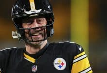 PITTSBURGH, PA - JANUARY 12: Aaron Rodgers #8 of the Pittsburgh Steelers warms up before kickoff against the Houston Texans during an AFC Wild Card Playoff game at Acrisure Stadium on January 12, 2026 in Pittsburgh, Pennsylvania.