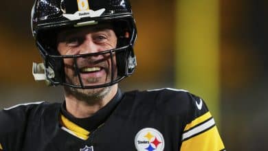 PITTSBURGH, PA - JANUARY 12: Aaron Rodgers #8 of the Pittsburgh Steelers warms up before kickoff against the Houston Texans during an AFC Wild Card Playoff game at Acrisure Stadium on January 12, 2026 in Pittsburgh, Pennsylvania.