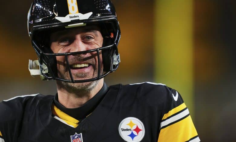 PITTSBURGH, PA - JANUARY 12: Aaron Rodgers #8 of the Pittsburgh Steelers warms up before kickoff against the Houston Texans during an AFC Wild Card Playoff game at Acrisure Stadium on January 12, 2026 in Pittsburgh, Pennsylvania.
