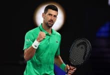 Serbia's Novak Djokovic reacts on a point to Netherlands' Botic van de Zandschulp during their men's singles match on day seven of the Australian Open tennis tournament in Melbourne on January 24, 2026.