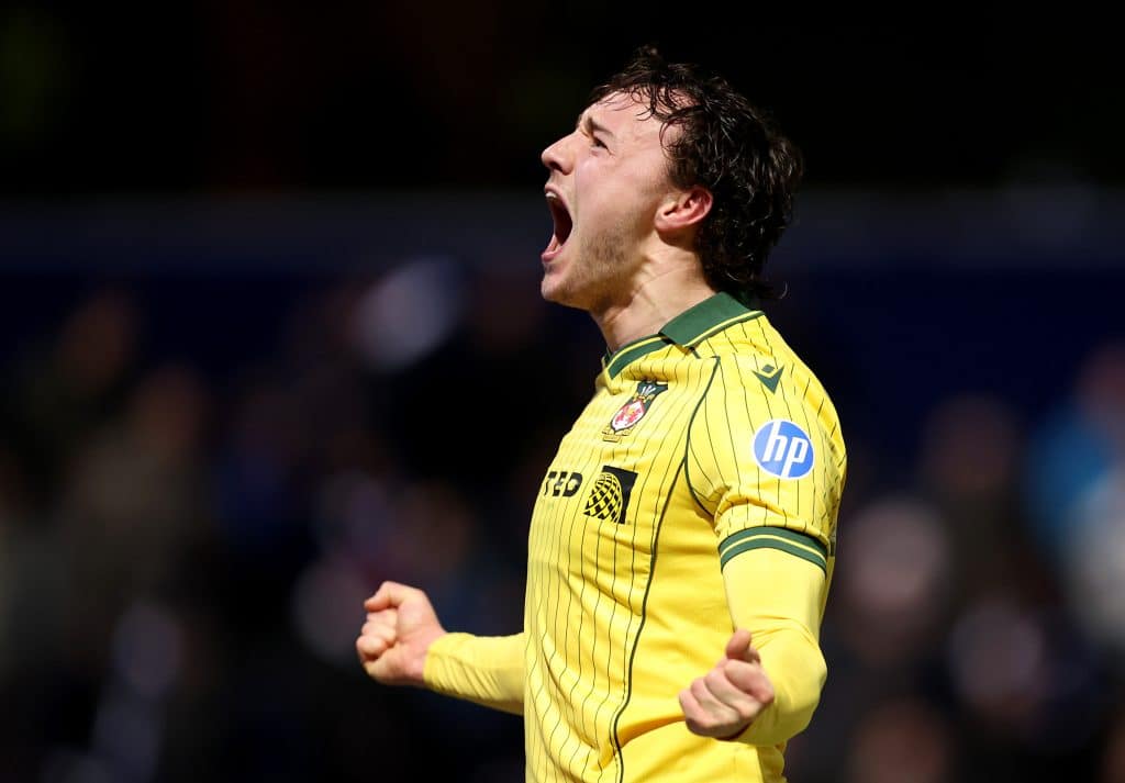 LONDON, ENGLAND - JANUARY 24: Ollie Rathbone of Wrexham celebrates scoring his team's third goal during the Sky Bet Championship match between Queens Park Rangers and Wrexham AFC at Loftus Road on January 24, 2026 in London, England. 