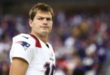 Drake Maye #10 of the New England Patriots stands on the sidelines prior to an NFL preseason football game against the Minnesota Vikings at U.S. Bank Stadium on August 16, 2025 in Minneapolis, Minnesota