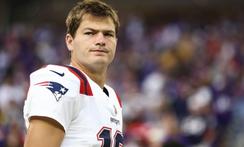 Drake Maye #10 of the New England Patriots stands on the sidelines prior to an NFL preseason football game against the Minnesota Vikings at U.S. Bank Stadium on August 16, 2025 in Minneapolis, Minnesota