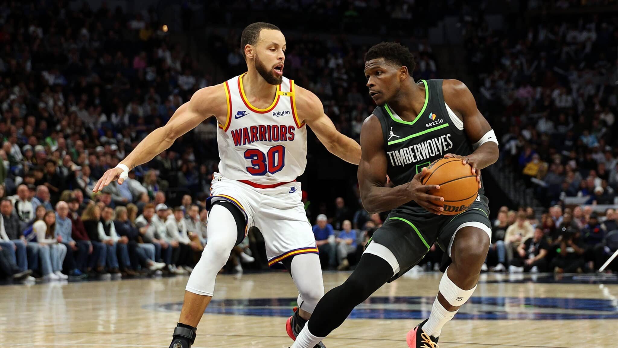 Stephen Curry e Anthony Edwards em ação por Minnesota Timberwolves x Golden State Warriors